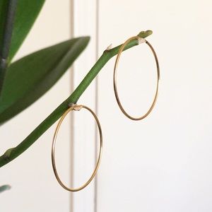 SOLD ON DEPOP. 14k solid gold hoop earrings